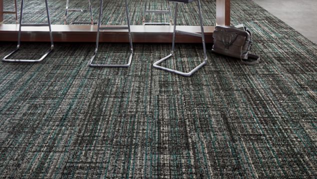 Interface Upload carpet tile and Textured Stones LVT in common area with bar and stools